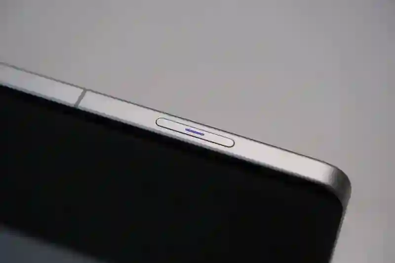 iPhone 上的拍照键：既不快捷，也不方便