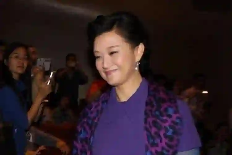 没想到，“销声匿迹”11年，与丈夫相约丁克的宋祖英已成人生赢家
